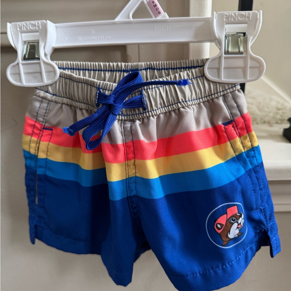 Buc-ee’s swim trunks baby with Blue and Red Stripes